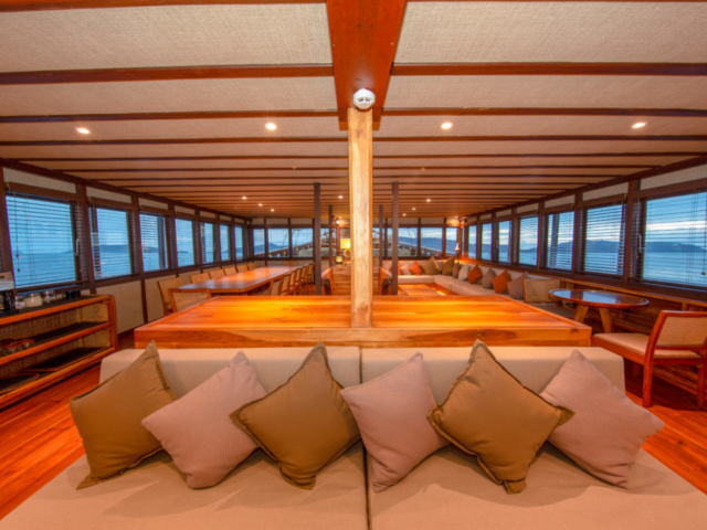 airconditioned hangout area of our Coralia Liveaboard in Indonesia