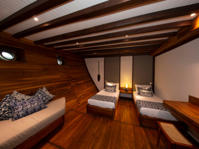 cabin with two seperate beds on our Coralia Liveaboard in Indonesia