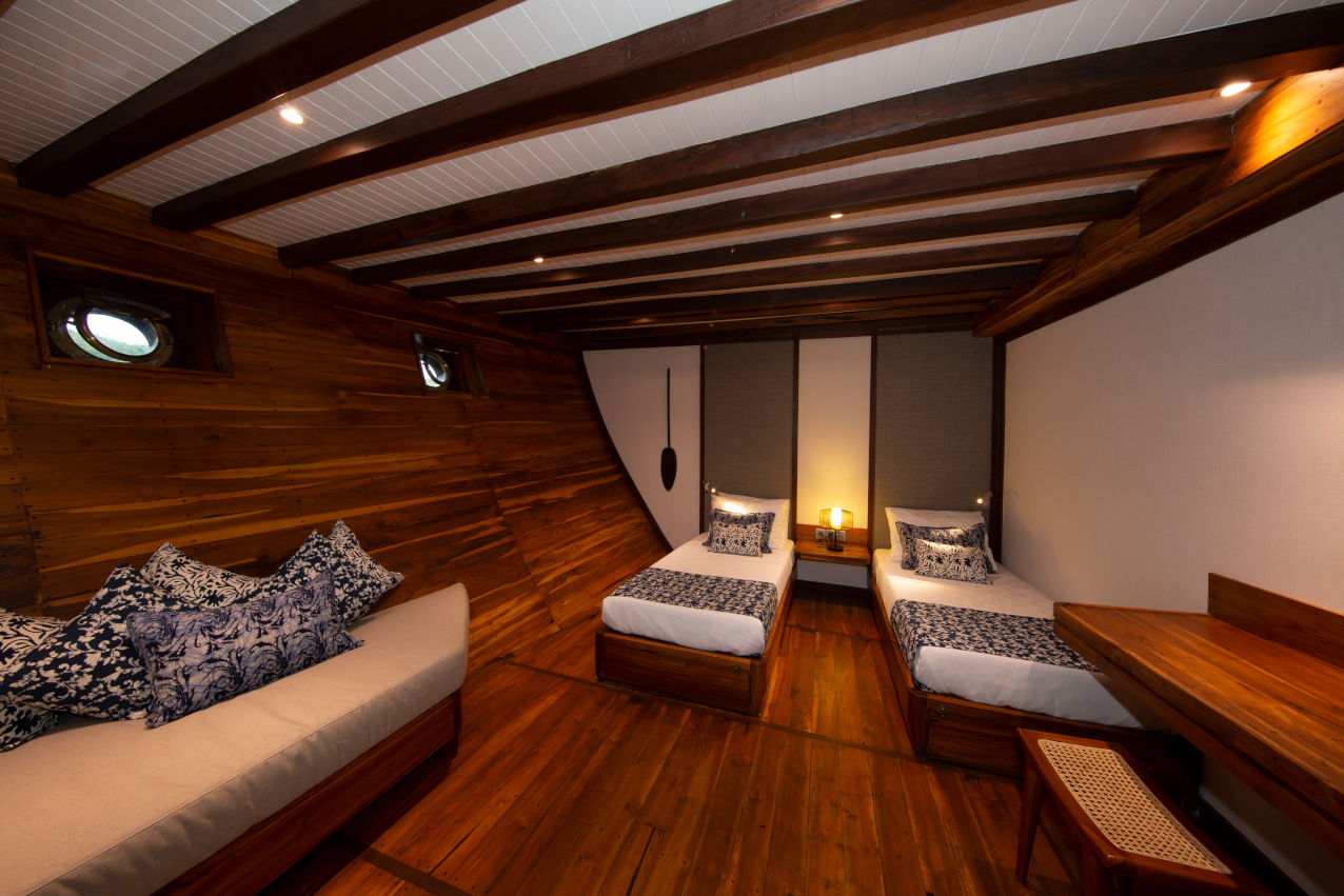 cabin with two seperate beds on our Coralia Liveaboard in Indonesia