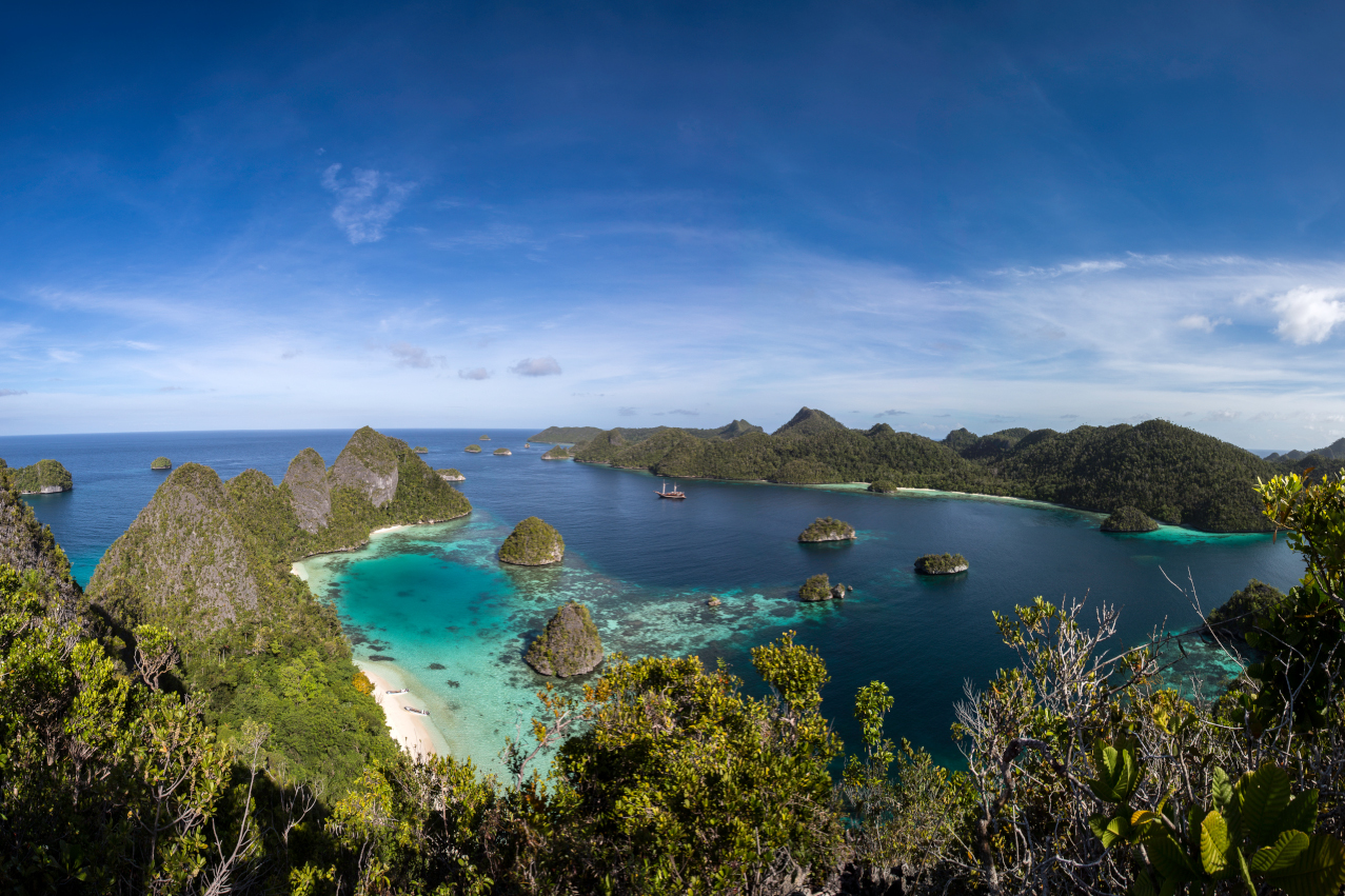 top view of our cruise ship Coralia between islands of Raja Ampat