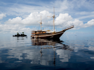 our cruise ship Coralia in between islands of Raja Ampat