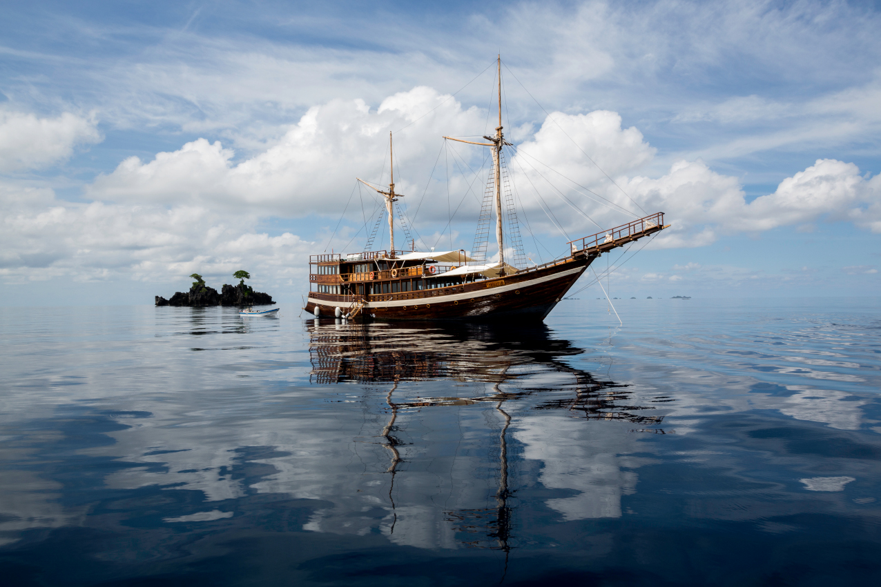 our cruise ship Coralia Liveaboard in between islands of Raja Ampat