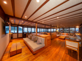 airconditioned hangout and television area on our Coralia Liveaboard in Indonesia