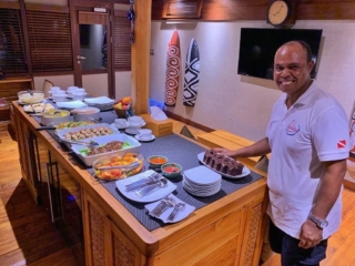 the main cook on our Coralia Liveaboard Indonesia