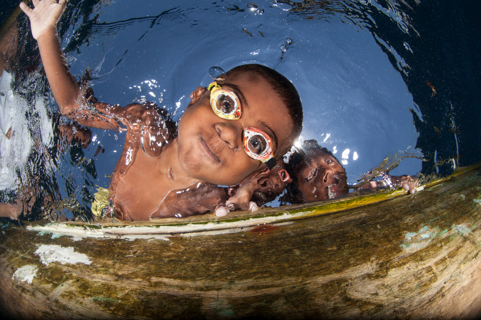 Alor Kids Playing at the Water Coralia Liveaboard Indonesia